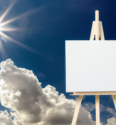Blank Canvas on a tall easel in a bright sky with clouds and a bright white sun.jpg