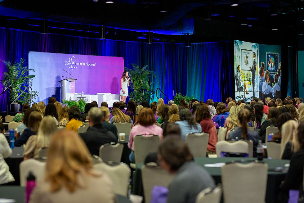 Emily Calandrelli presenting during a conference keynote at the Hyatt Regency New Orleans