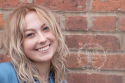 Sarah against brick wall close up_9572