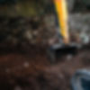 Digger digging out soil
