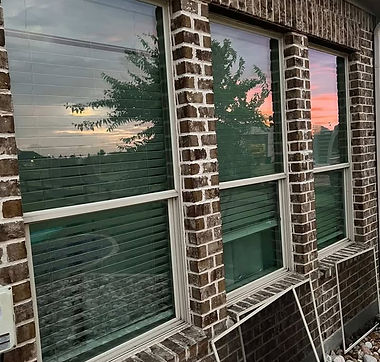 Professional exterior window cleaning service on a residential home by High Shine Services.