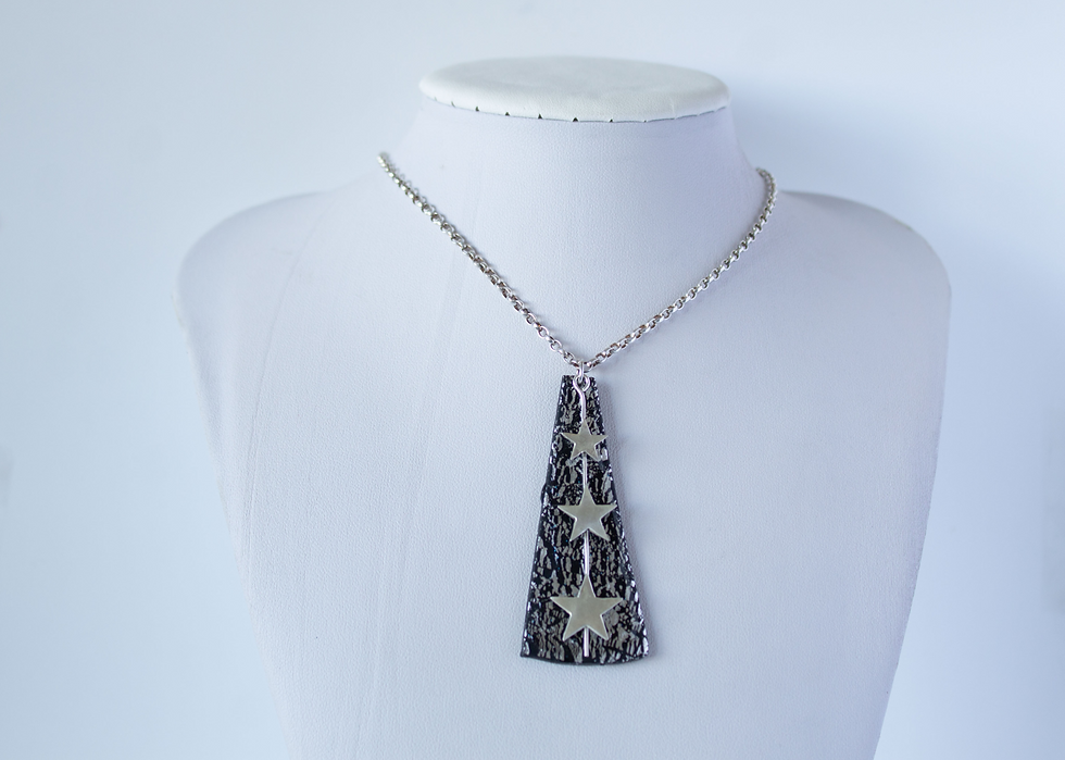 Thumbnail: handmade polymer clay black with silver triangle necklace with 3 fine silver star overlaid