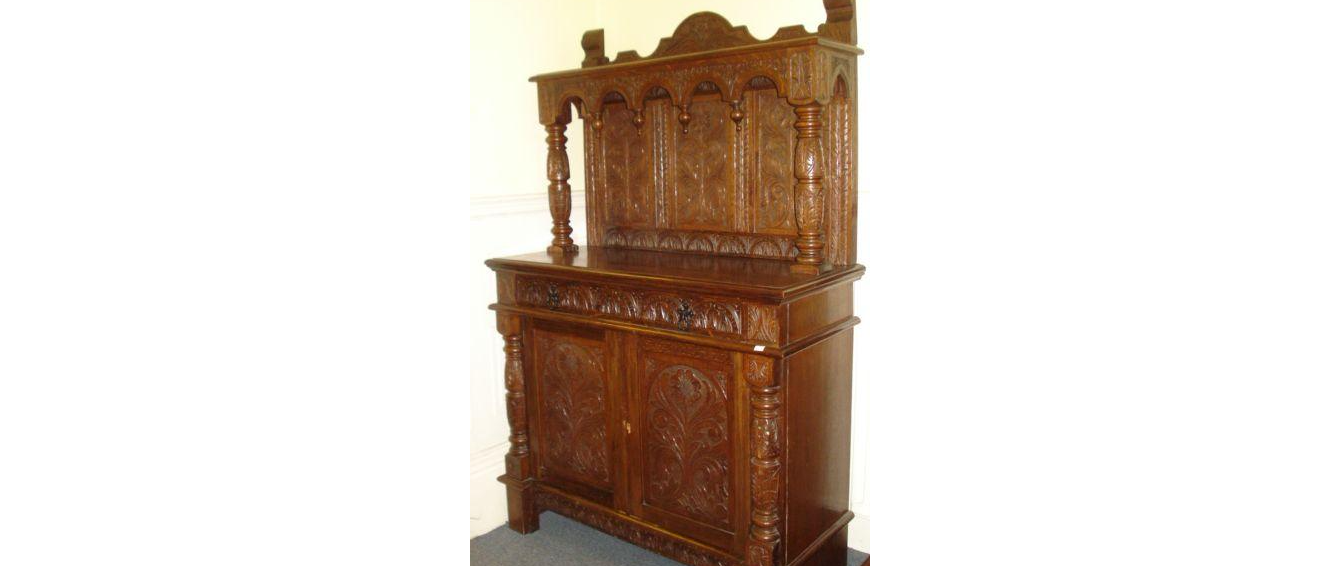 A HEAVILY CARVED OAK DRESSER IN 17TH CENTURY STYLE