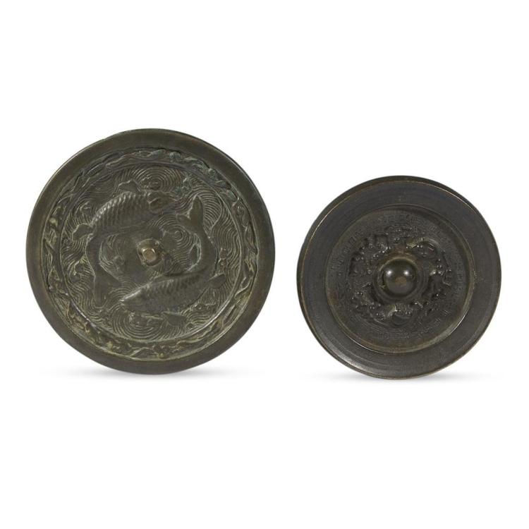Two Chinese cast bronze circular mirrors