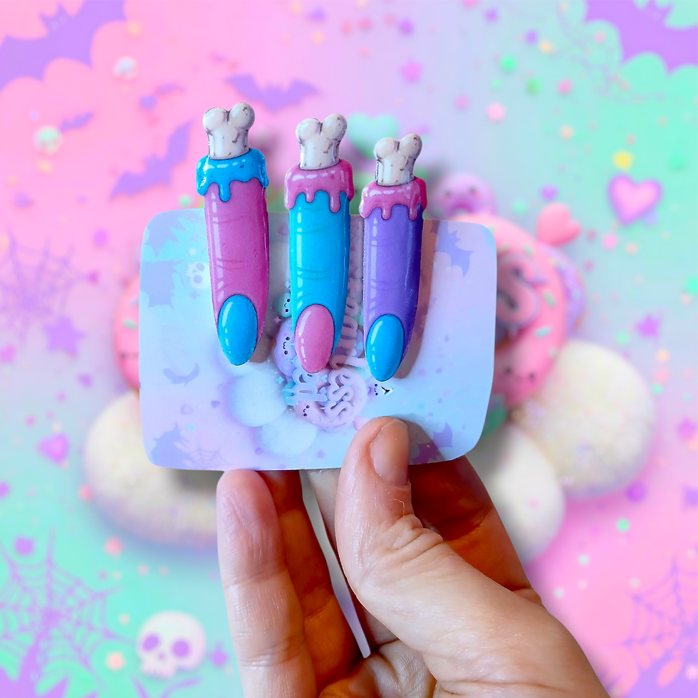 Thumbnail: showing me holding the hair clips on the backing card for them, very pastel, kawaii, gore hair accessories