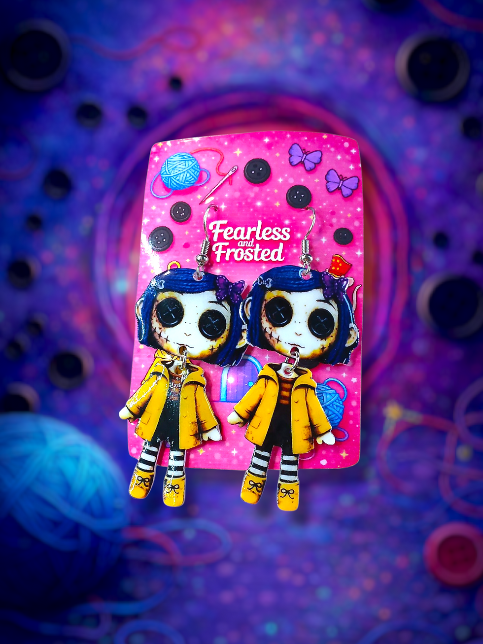 Thumbnail: a doll with blue hair an black button eyes nostalgic creepy dangle earrings