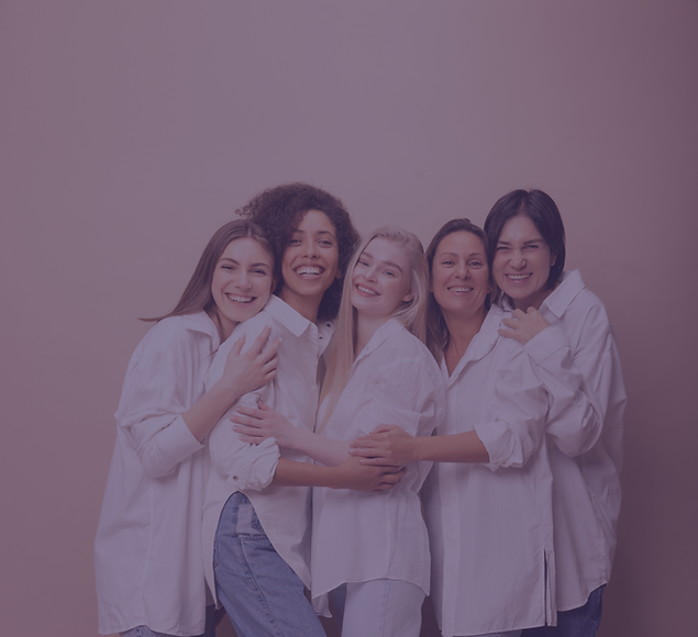 full-length-happy-diverse-inter-age-ladies-white-shirts-jeans-smiling-camera-against-beige