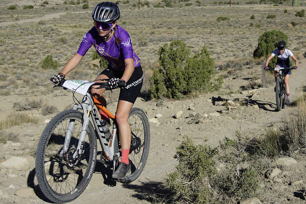 Sabrina Miner mountain biking racing in Price, UT at her third race of the season on Friday/Saturday Sept. 26 and 27. This is the first year of the mountain biking team, Miner competes alone. Photo courtesy of Nic Sims.