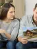 image of couple disagreeing over house