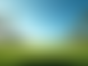 Eye-level view of a golf course with palm trees and a clear blue sky