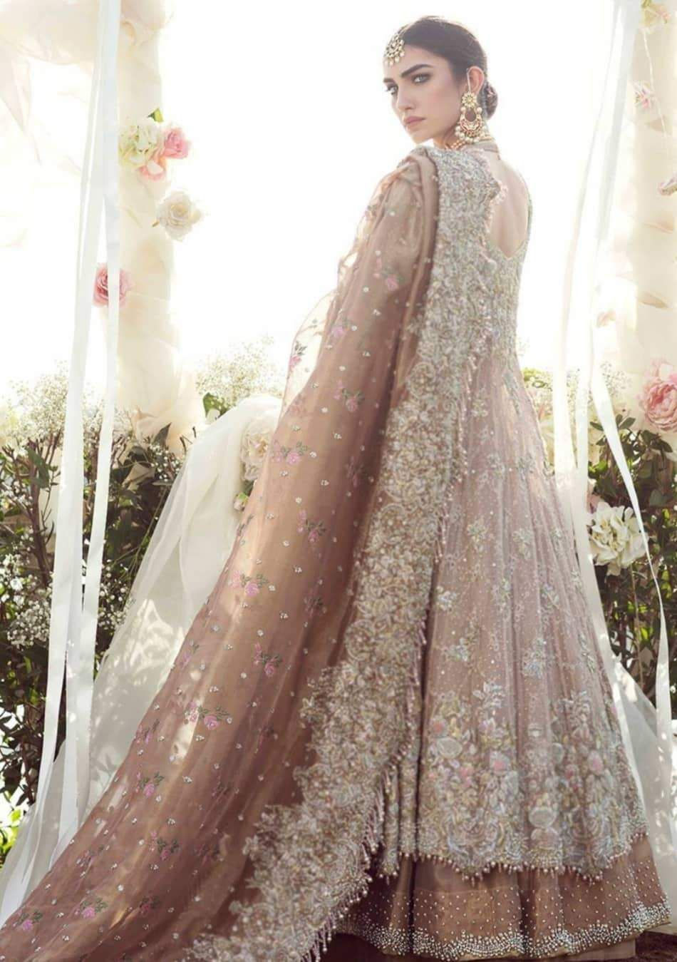 Rose gold lehnga for Indian Brides shot by best wedding photography studio in delhi and ncr kachins studio