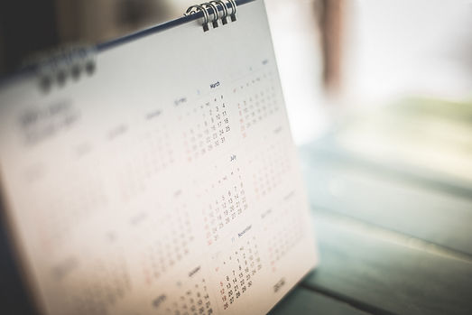 Blurred calendar page dark tone.jpg