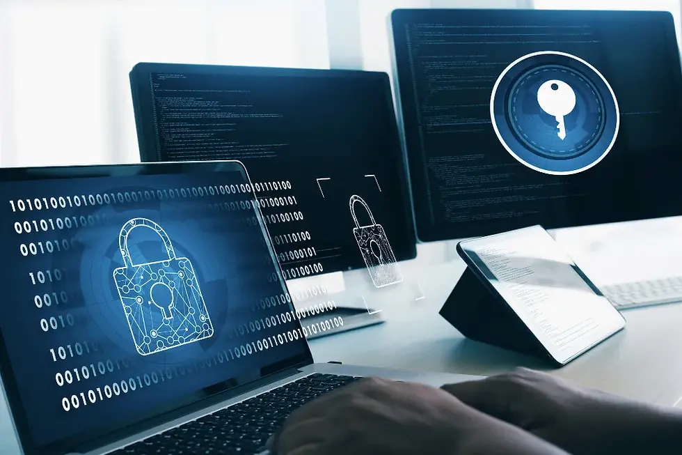 A laptop and tablet with dark screen and blue locks and keys on.