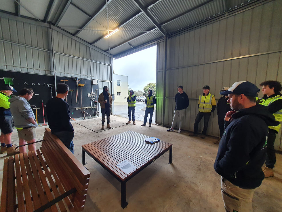 Landscape construction staff attend a Toolbox at ID Landscaping depot in Research, Victoria.