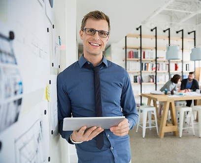 Professional Man Holding a Tablet