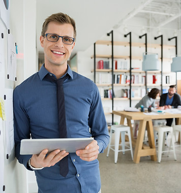 Professional Man Holding a Tablet