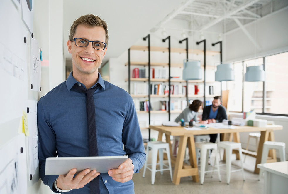 Professional Man Holding a Tablet