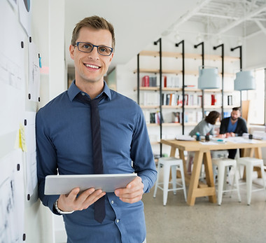 Professional Man Holding a Tablet