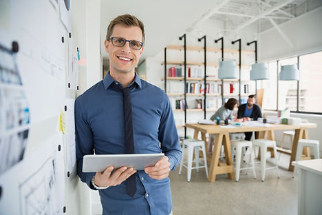 Professional Man Holding a Tablet