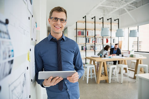 Professional Man Holding a Tablet