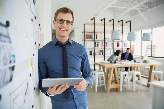 Professional Man Holding a Tablet