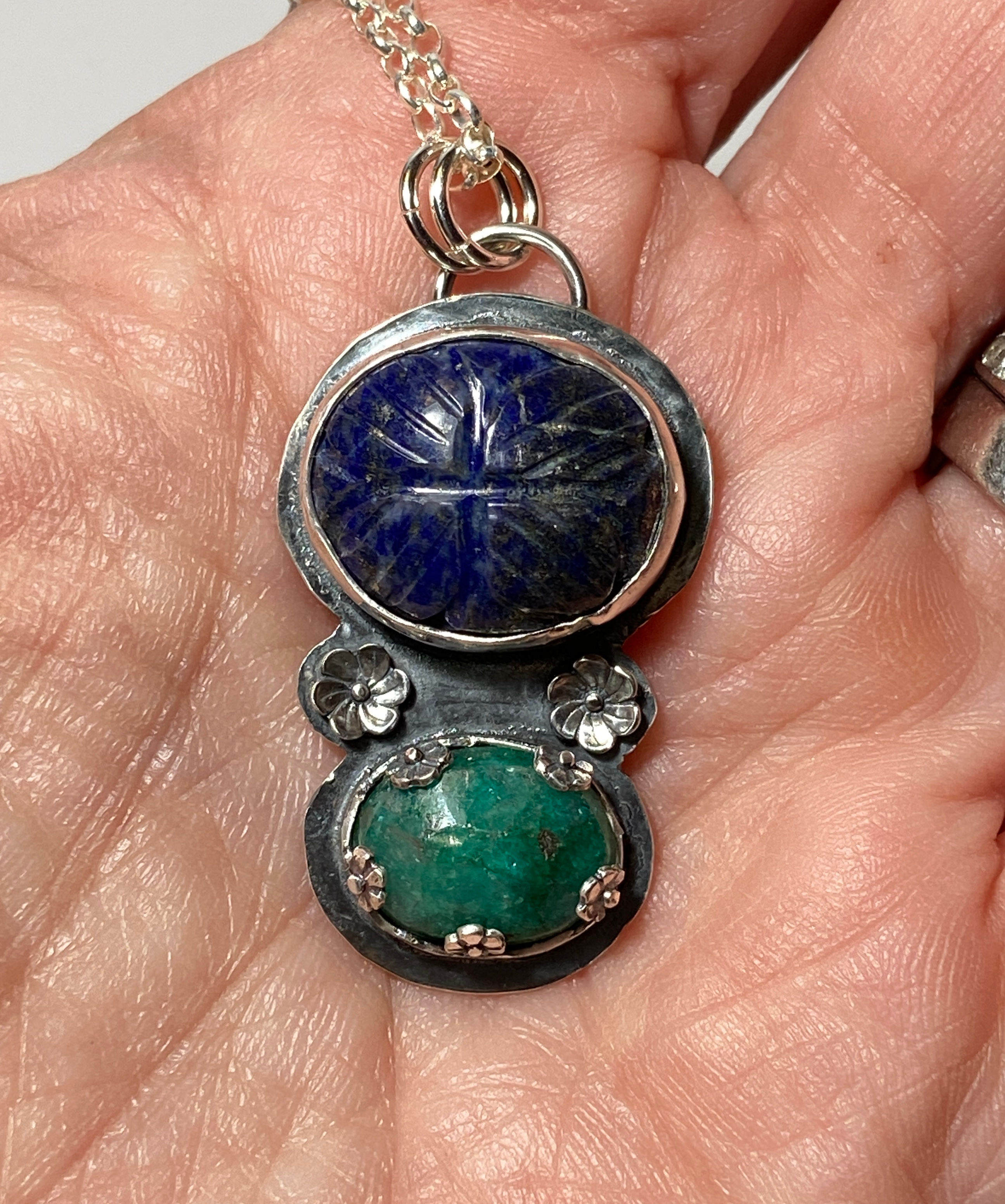 Sterling silver pendant with hand carved lapis