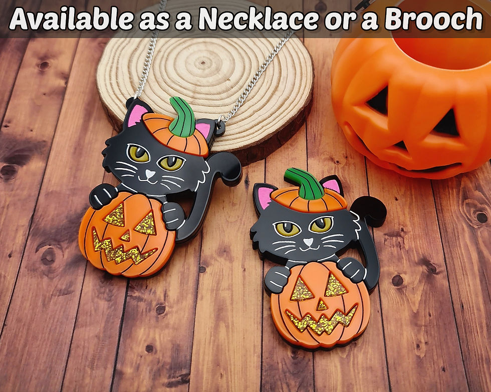 Miniatura: Pumpkin Kitty Brooch and Necklace displayed together on a wood panel background