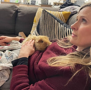 me and waffle having cuddle time on the couch
