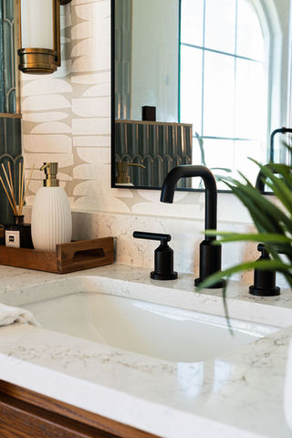 quartz countertop, black fixture, wallpaper, black mirror, modern bathroom