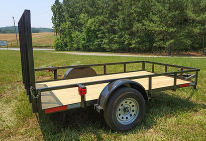 MST-Utility-Trailer-1Z9BU1012PD668117-side-view-4-mesh-gate-up-4x3-1200px_edited.jpg