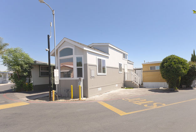 wide front and side veiw of mobile home