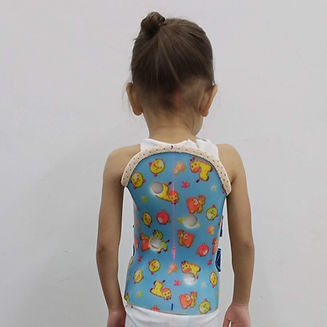 Child wearing scoliosis brace
