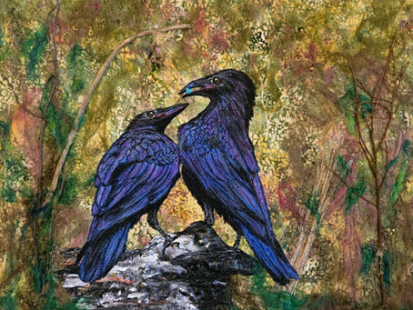 Fiber art piece titled What the Ravens Know by Deb Deaton, featuring two blue-black ravens perched together against a richly textured woodland background in greens, golds, browns and burgundy.