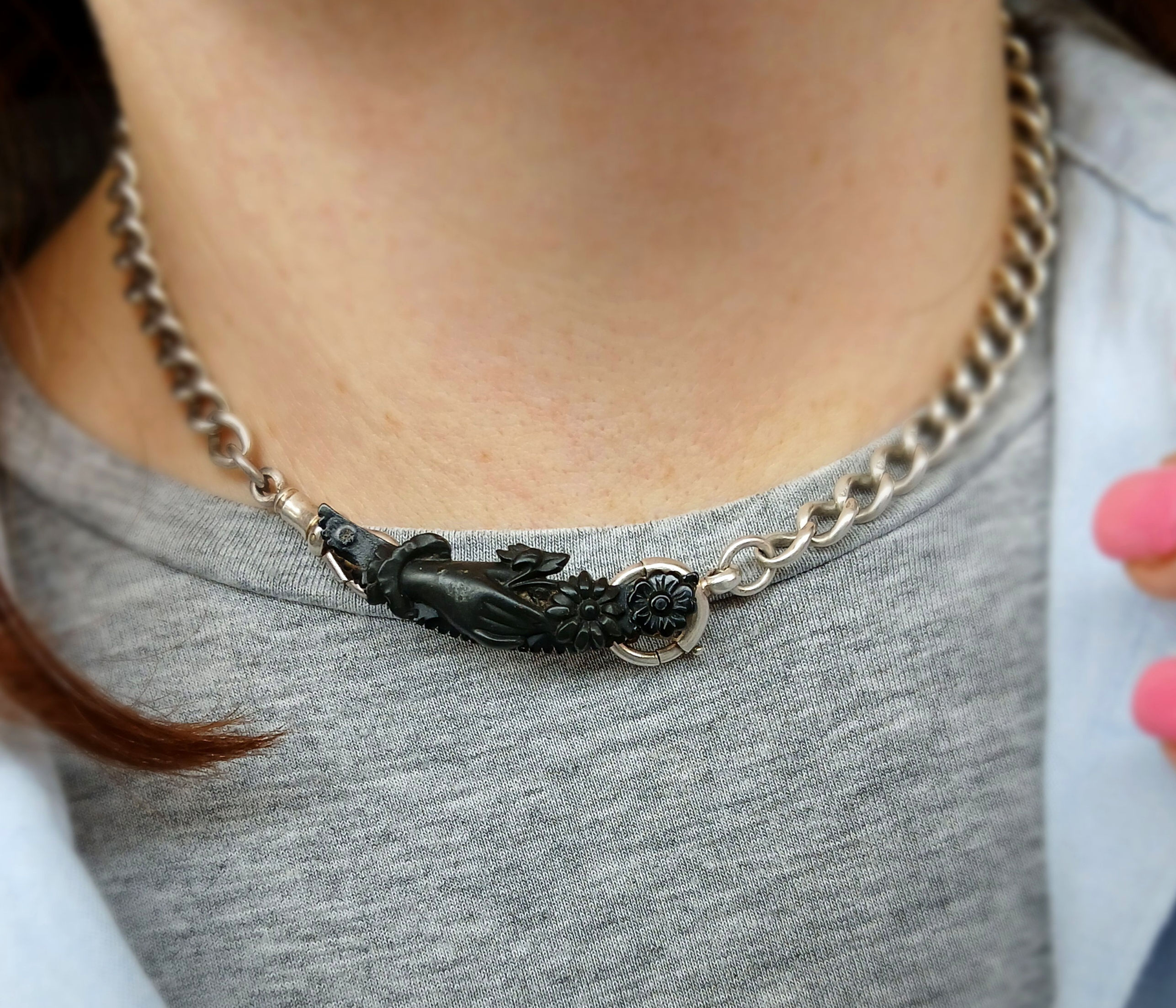 Antique Vulcanite Hand & Flower Brooch