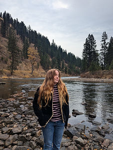 Photographer in forest in Idaho