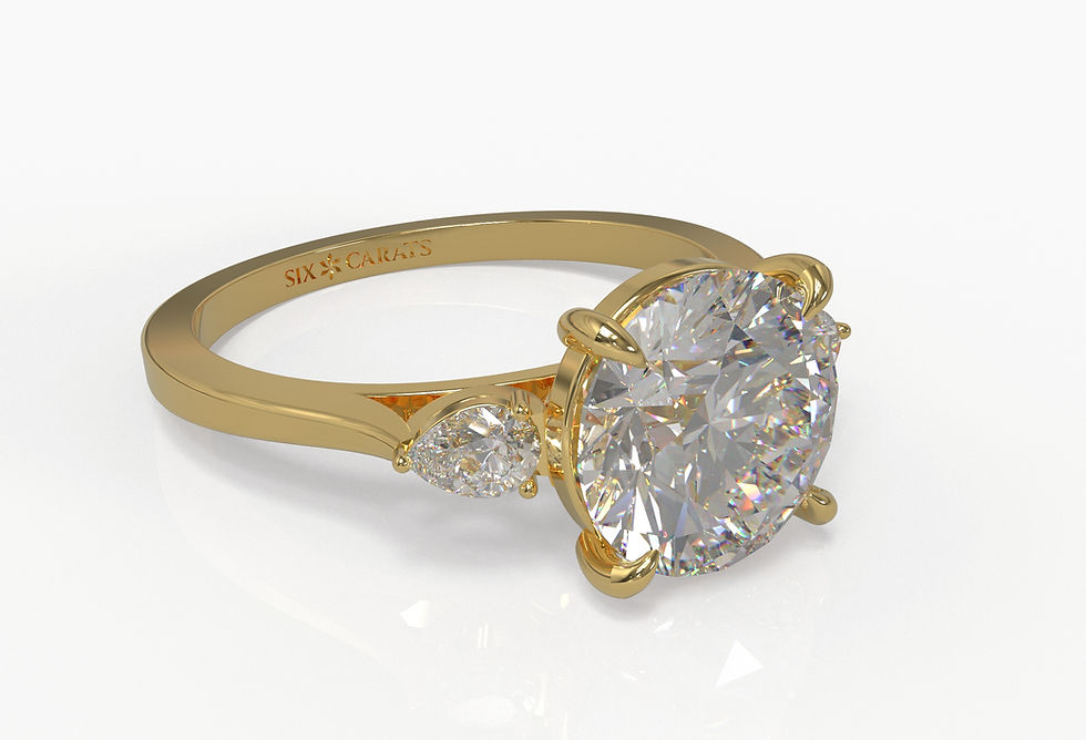 Thumbnail: The Lucy - Round Brilliant Cut Diamond with Pear Side Stones Ring