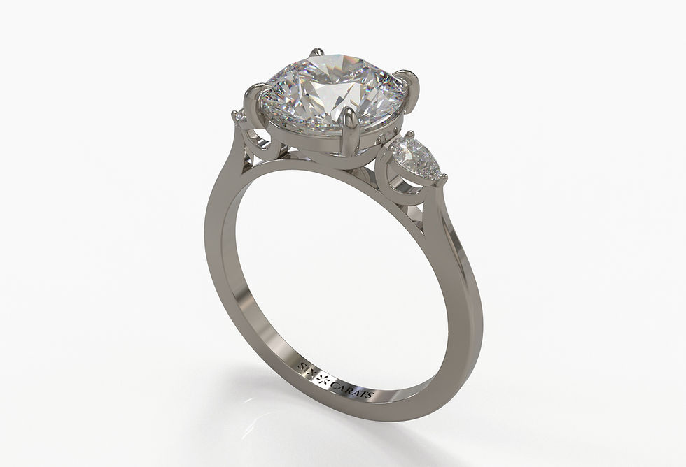 Thumbnail: The Lucy - Round Brilliant Cut Diamond with Pear Side Stones Ring
