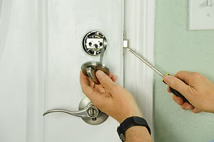 Residential Locksmith Installing Deadbolt Lock
