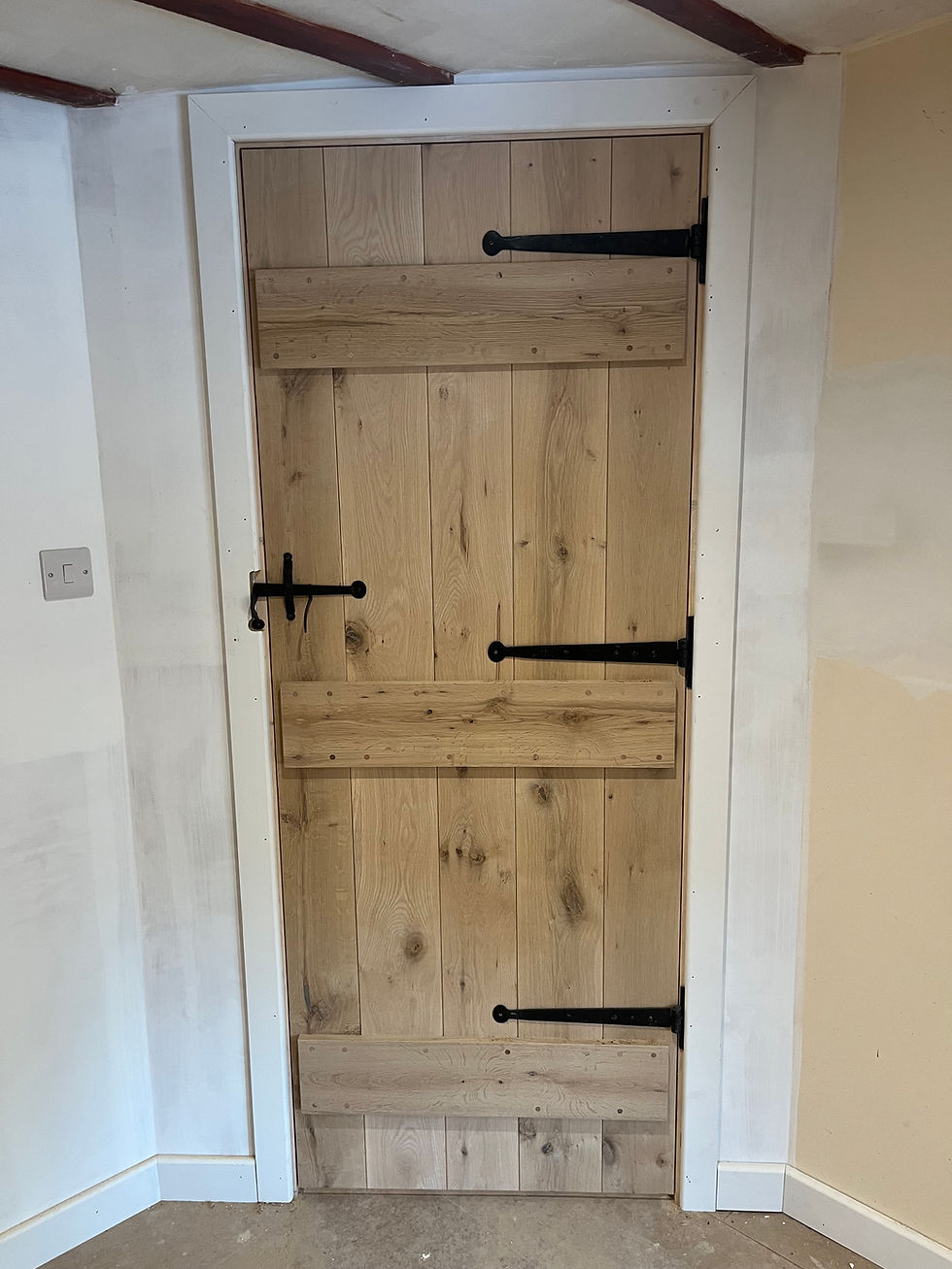 the back of a finished ledged oak door