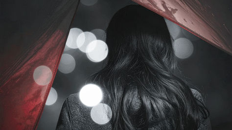 Women shielded by a rent tent