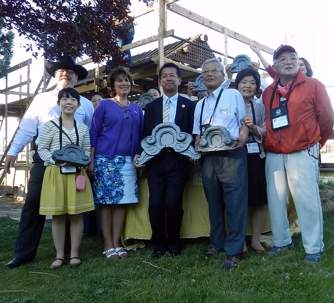 The Sister City delegation from Tokai-mura, Japan, visited Idaho Falls the week of July 4th.  There was a reception in the Japanese Garden and they stopped by to explore the pavilion.  The ham wearing the cowboy hat is Edward.