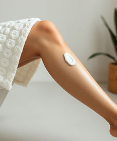 woman leg with lotion.jpg