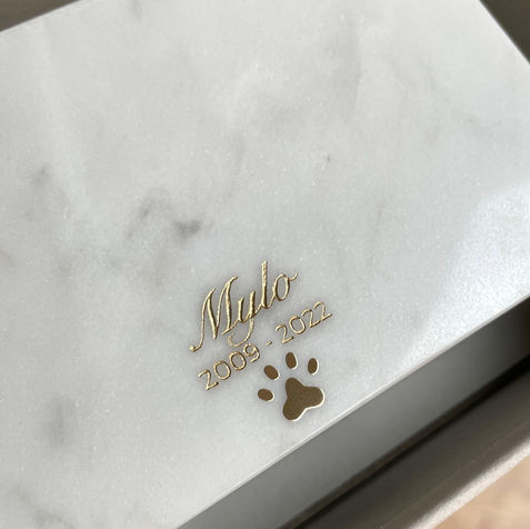White marble pet urn with name