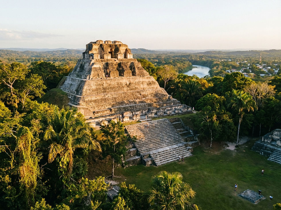 wide shot, El Castillo pyramid at the Xunantunich Mayan ruins, San Ignacio Belize, golden hour light hitting the ancient stone, lush jungle surroundings, landscape 485x363
