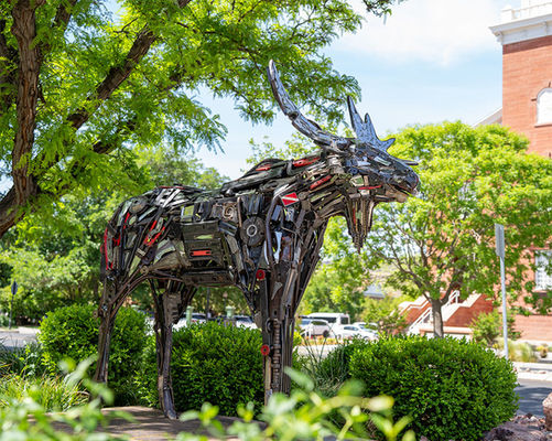 alt="Welded bull moose sculpture named Humphrey, hand-crafted from reclaimed car parts and vintage tools."