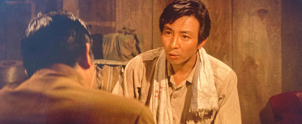 主人公の親友：原（田村高廣）