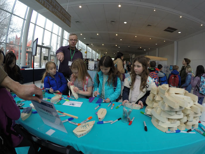 Dave Forcucci working with students at Pacific Science Center during 2020 Climate Change Curiosity Expo in Seattle, Washington USA