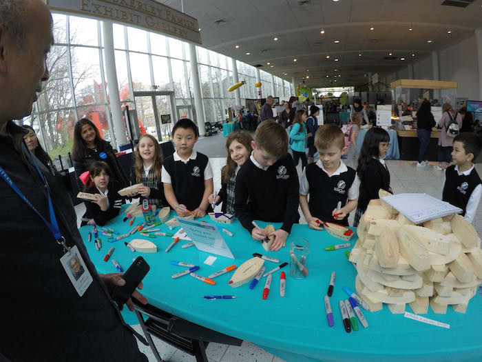 Dr. Ignatius Rigor working with students at Pacific Science Center during 2020 Climate Change Curiosity Expo in Seattle, Washington USA