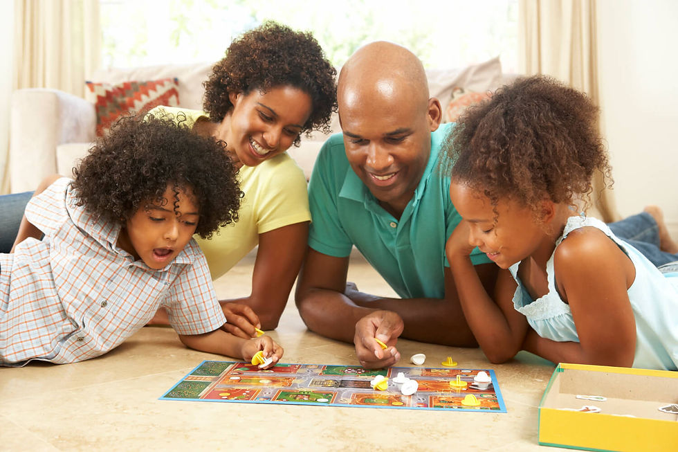 This image shows a joyful family bonding over a board game, full of laughter and teamwork. That might occasionally be true in real life, but it does not show the other sides of play: the frustration, negotiation, concentration and seriousness.