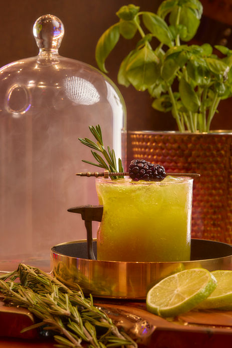 Signature cocktail with garnish and ice – shot for a bar menu in Wynwood, Miami.